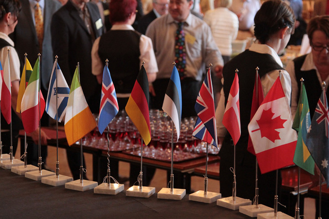 In the picture flag row consisting of flags of the parcipants countries. Reception of the City of Kuopio, 2014.
